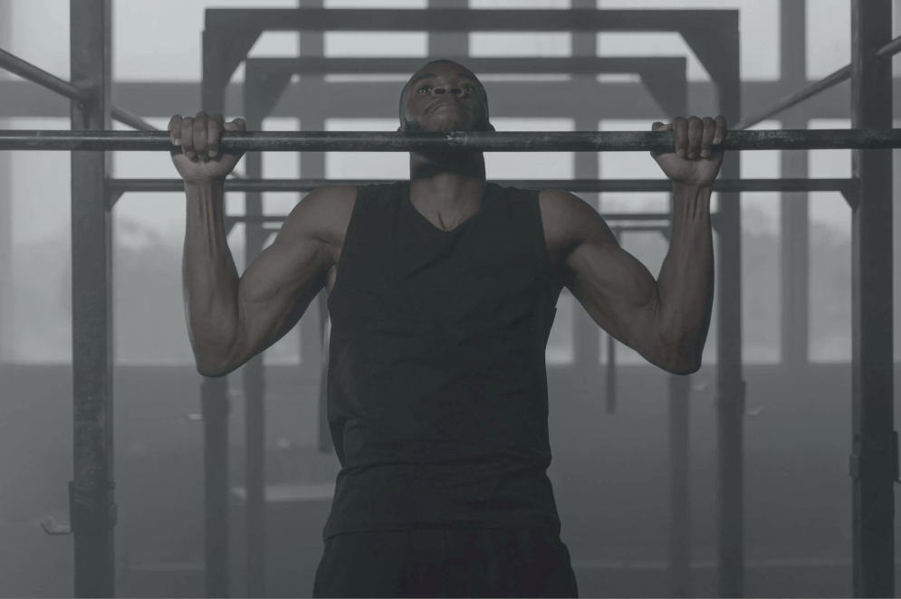 man doing a chin up